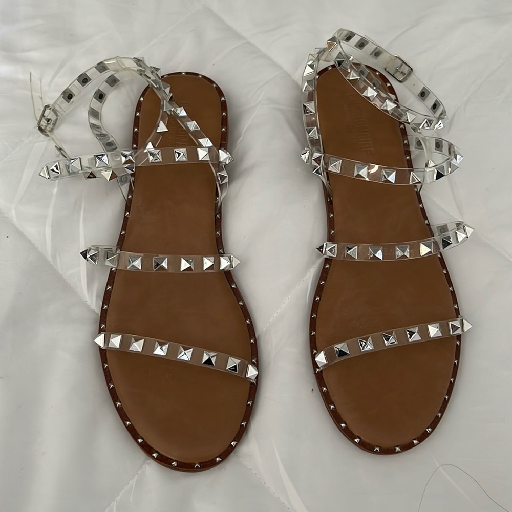 Brand new - never worn. Size 10 strappy studded sandals.
